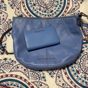 Baby blue Michael Kors cross body/ matching wallet